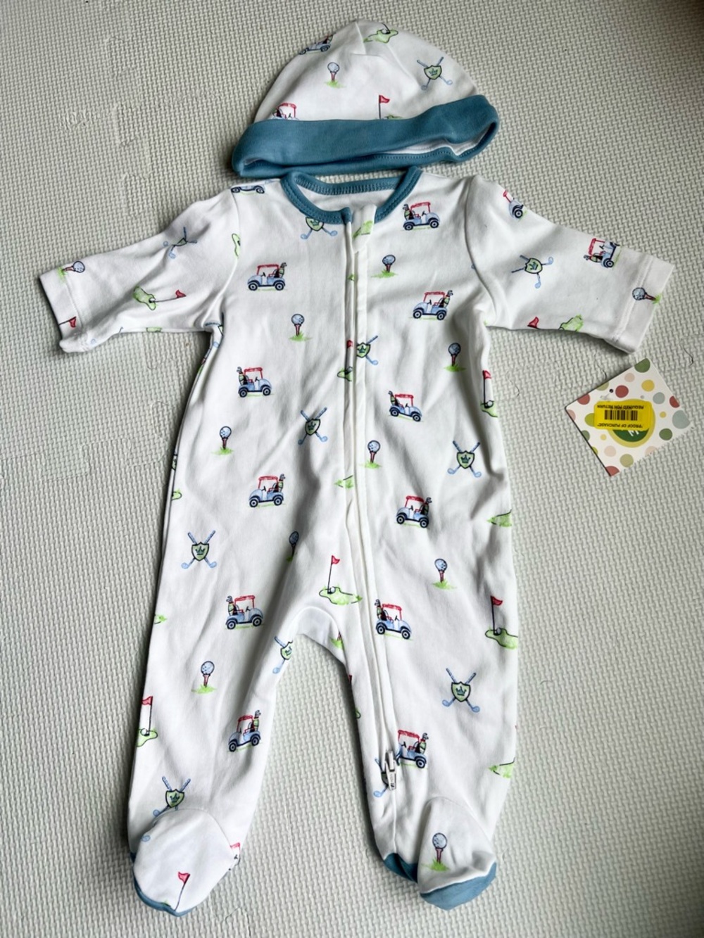 Mud Pie White Footed Pajamas with Blue Trim and Golf Cart Print